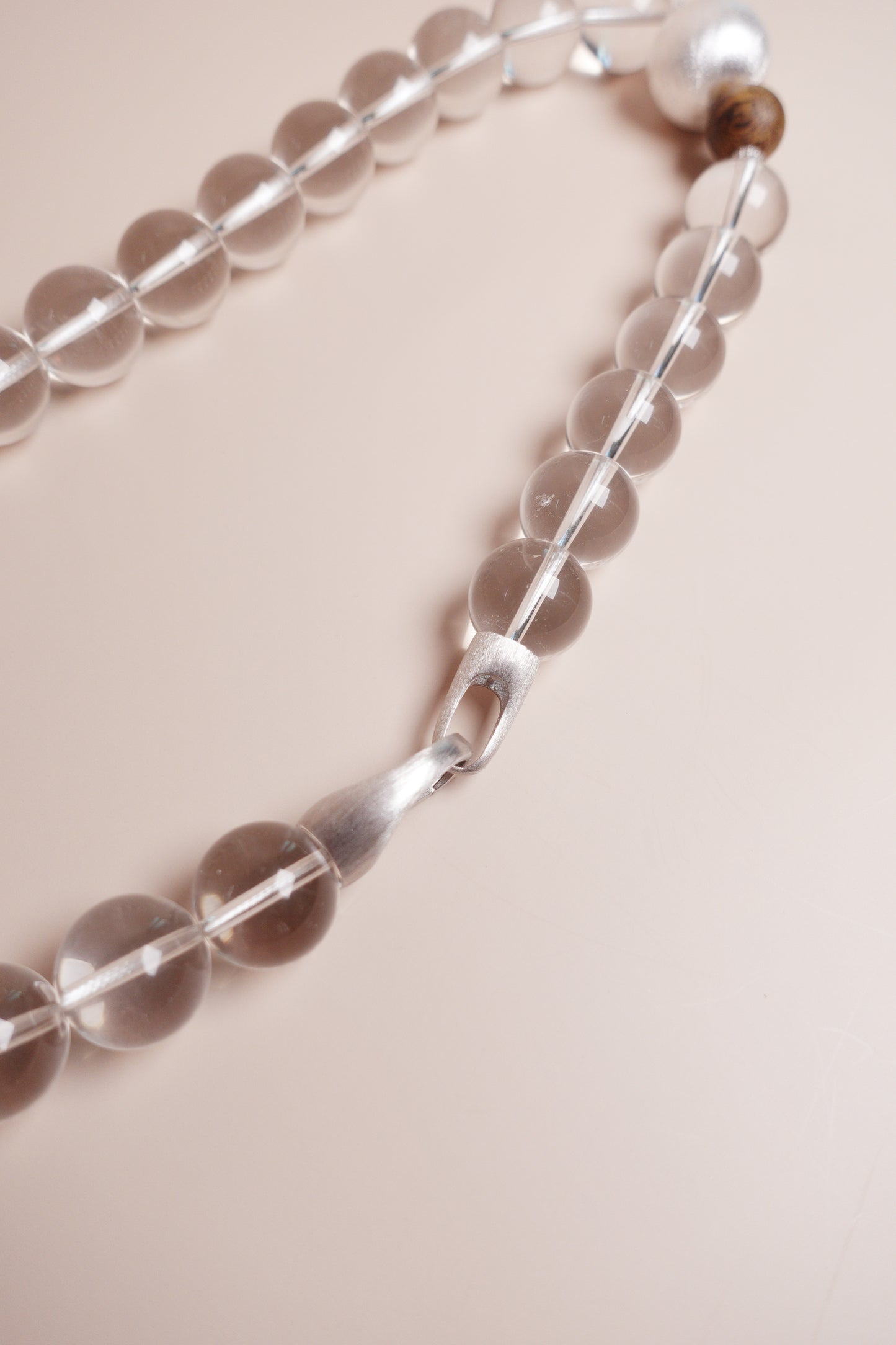 healing white crystal beads with agarwood and silver