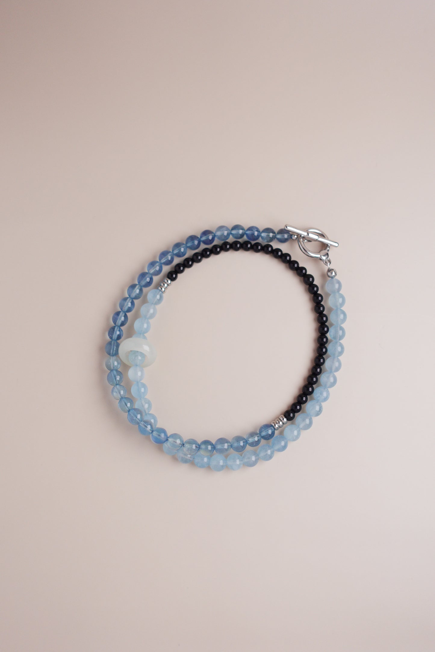 White gold-plated stainless steel aquamarine & onyx necklace featuring 6 mm beads.