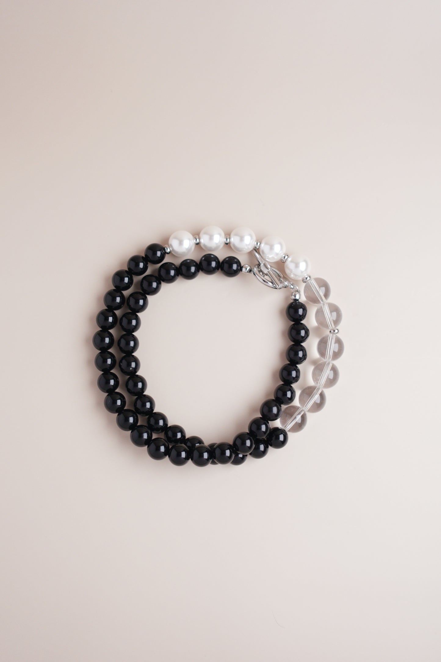 in-Yang Harmony necklace with black onyx and lustrous pearl beads.
