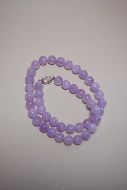 12 mm natural lavender amethyst necklace by Between Dust Creations with white gold–plated silver clasp.