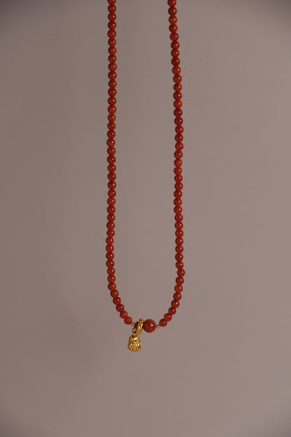 Ember Blessing Necklace – Nanhong Flame Beads & 18K Gold Gourd