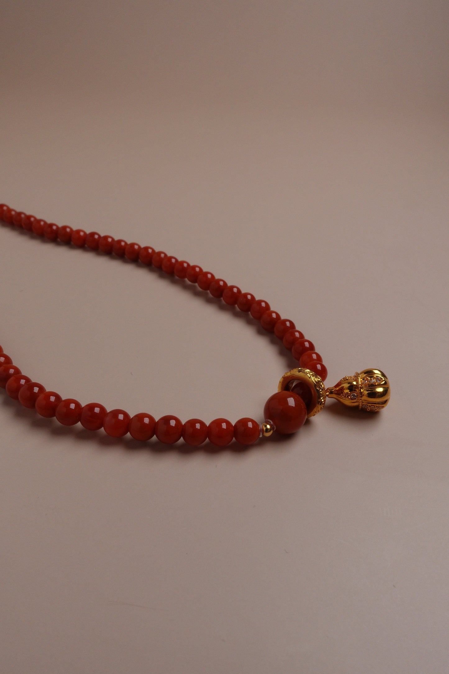 Ember Blessing Necklace – Nanhong Flame Beads & 18K Gold Gourd