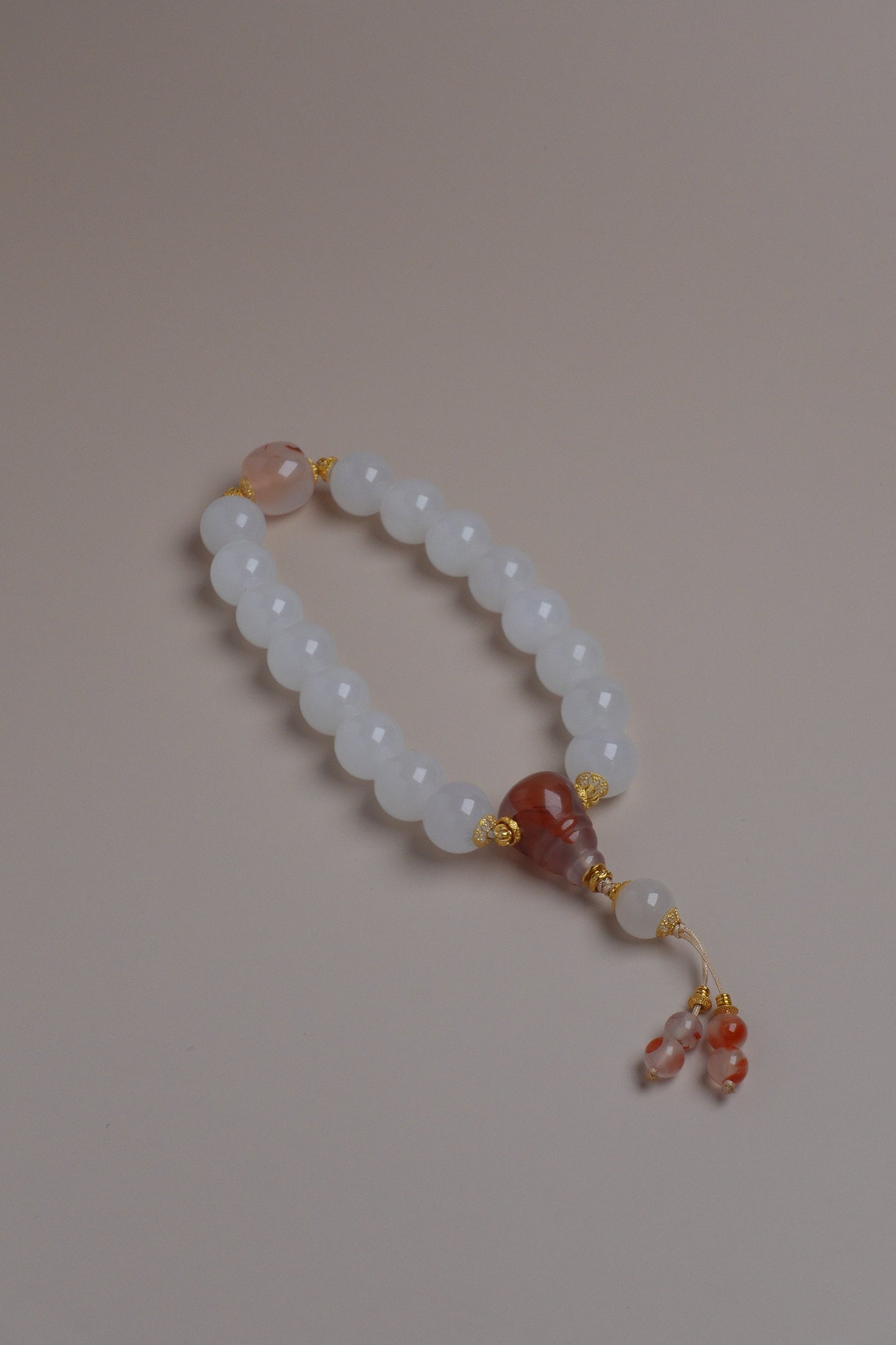 High-grade Nanhong red and Hetian white jade 9mm bracelet with 18K gold accents