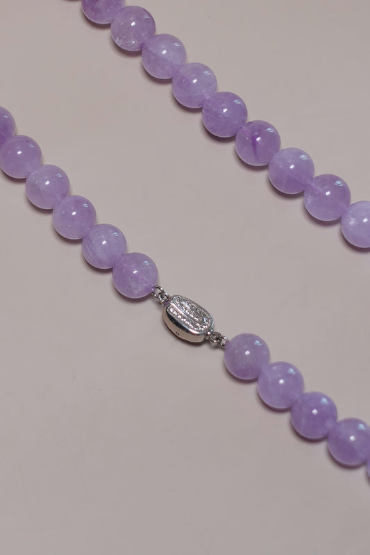 Calming lavender amethyst bead necklace featuring a white gold–plated sterling silver clasp.