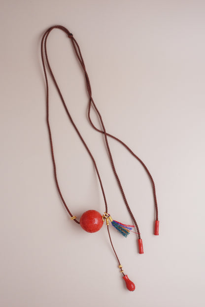 Coffee-cord necklace with 22 mm hand-carved cinnabar ‘Full Blessing’ pendant, cloud-pattern vase motif, Tibetan mini tassel & gold-vermeil