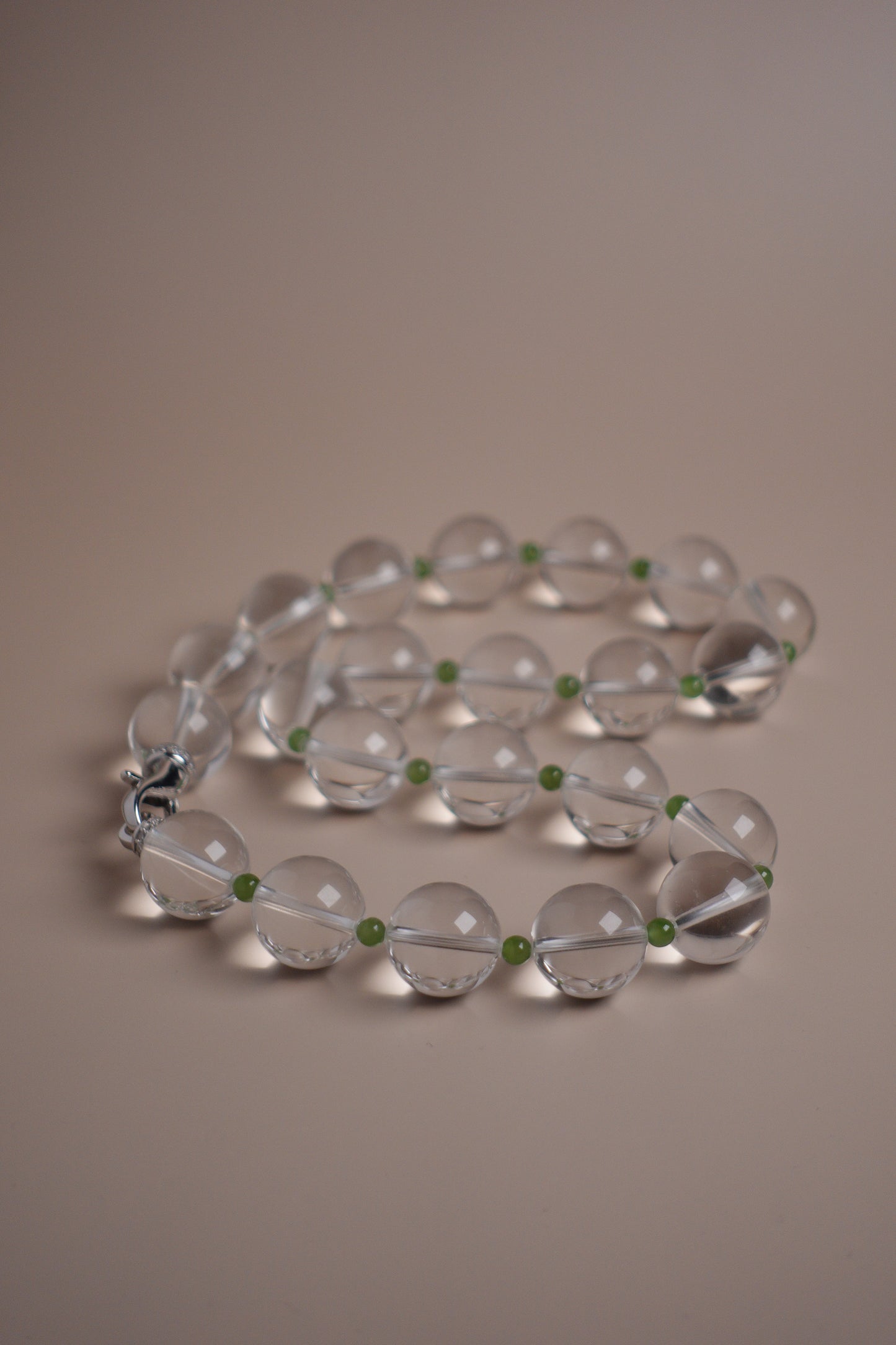 Clarity Bloom necklace with 15mm Brazilian quartz and green garnet beads