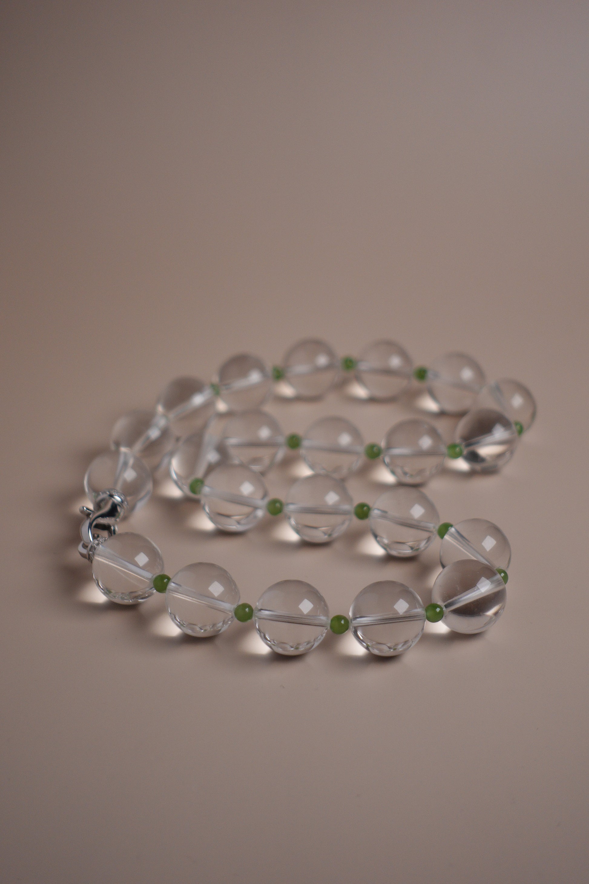 Clarity Bloom necklace with 15mm Brazilian quartz and green garnet beads