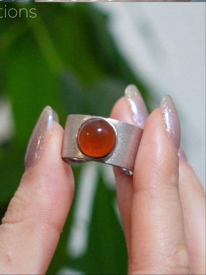 Natural Nanhong red jade ring worn on hand, grounding Root Chakra stone with sterling silver band