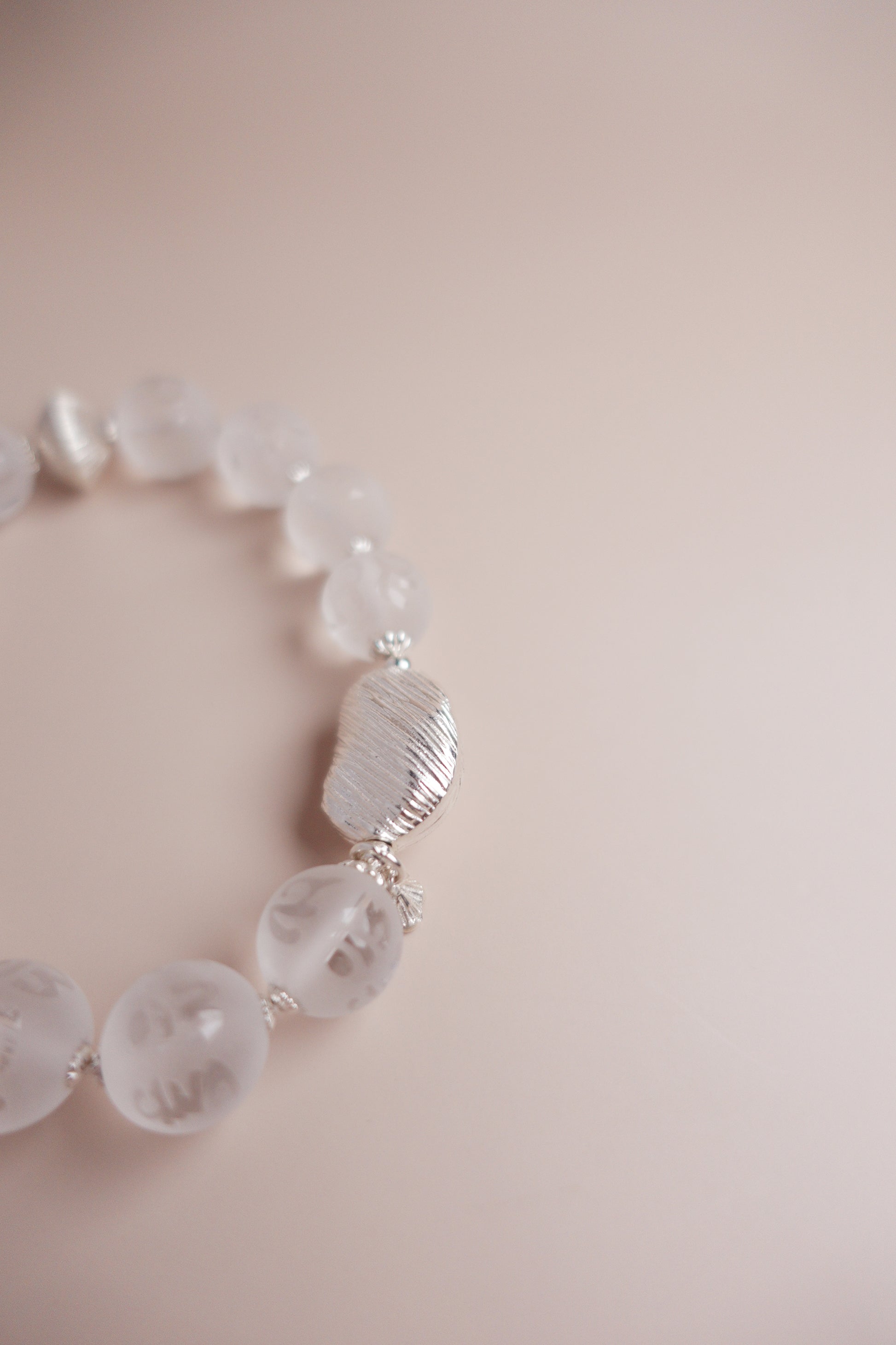 Serenity Mantra frosted quartz & Tara charm bracelet with brushed sterling silver accents