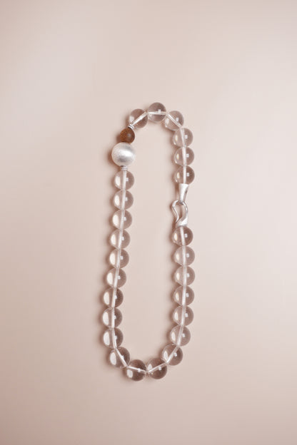white crystal necklace with agarwood and sterling silver
