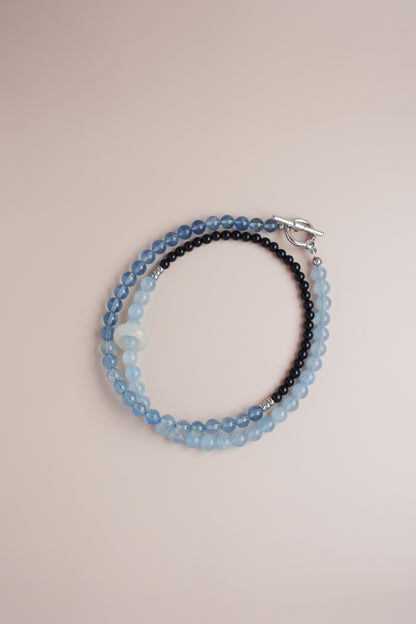 White gold-plated stainless steel aquamarine & onyx necklace featuring 6 mm beads.