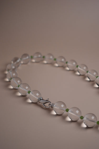 White quartz necklace with silver clasp and green garnet spacers